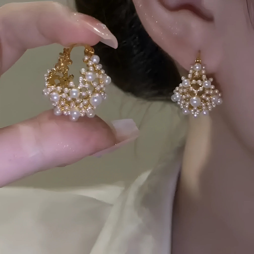 Gold colour women's flower basket earrings with copper construction and rice-shaped bead inlay