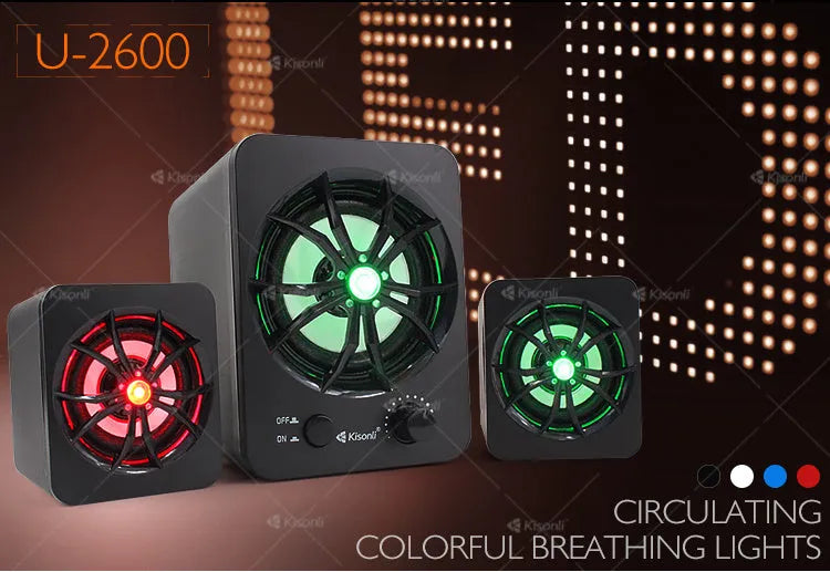 Green USB-powered 2.1 channel computer speaker with colourful LED lighting on desktop