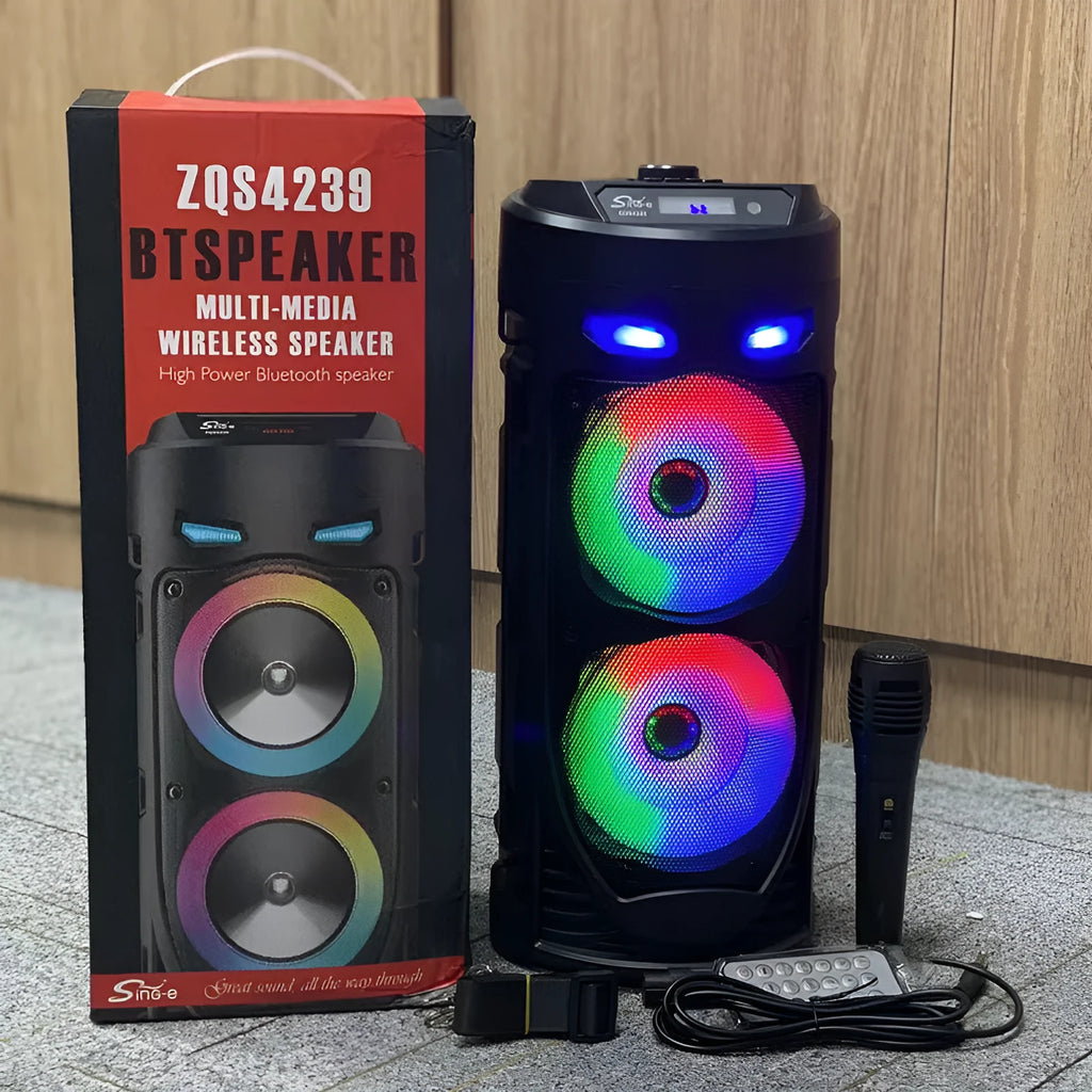 Black portable Bluetooth speaker with dual horn design and wheat detailing, showing USB port and card slot