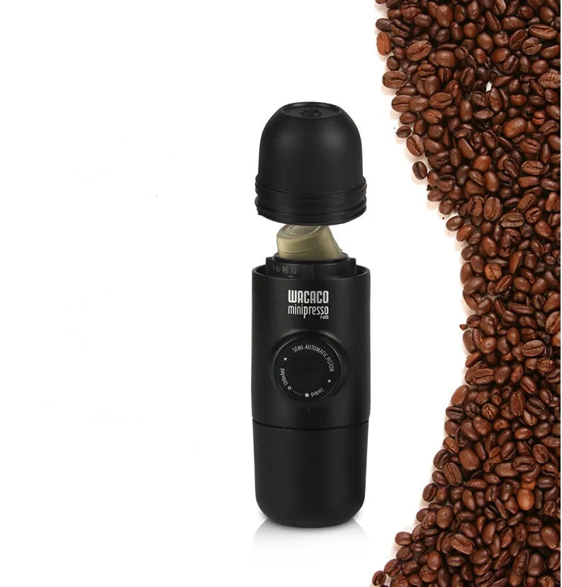 Compact black portable manual coffee machine for espresso, shown with dimensions 6cm by 17.5cm