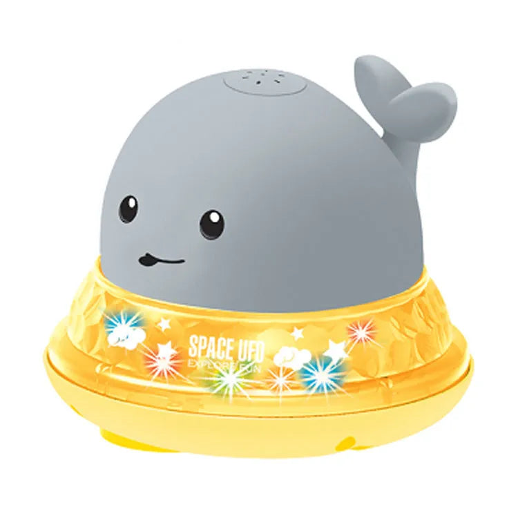 Grey or white cartoon whale bath toy that sprays water with LED lights and music