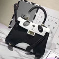 A square cow leather handbag with a sweet panda animal print, shown in two size options.