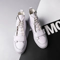 Black and white men's microfiber ankle boots with high-top sneaker design for winter wear