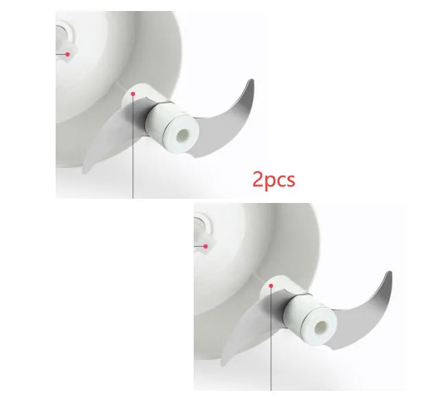 Compact manual food chopper with plastic housing and stainless steel blades for vegetable preparation