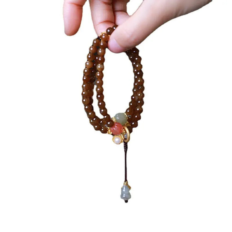 Brown jade Hetian jade three-ring geometric bracelet with silver-plated butterfly and gourd pearl accents