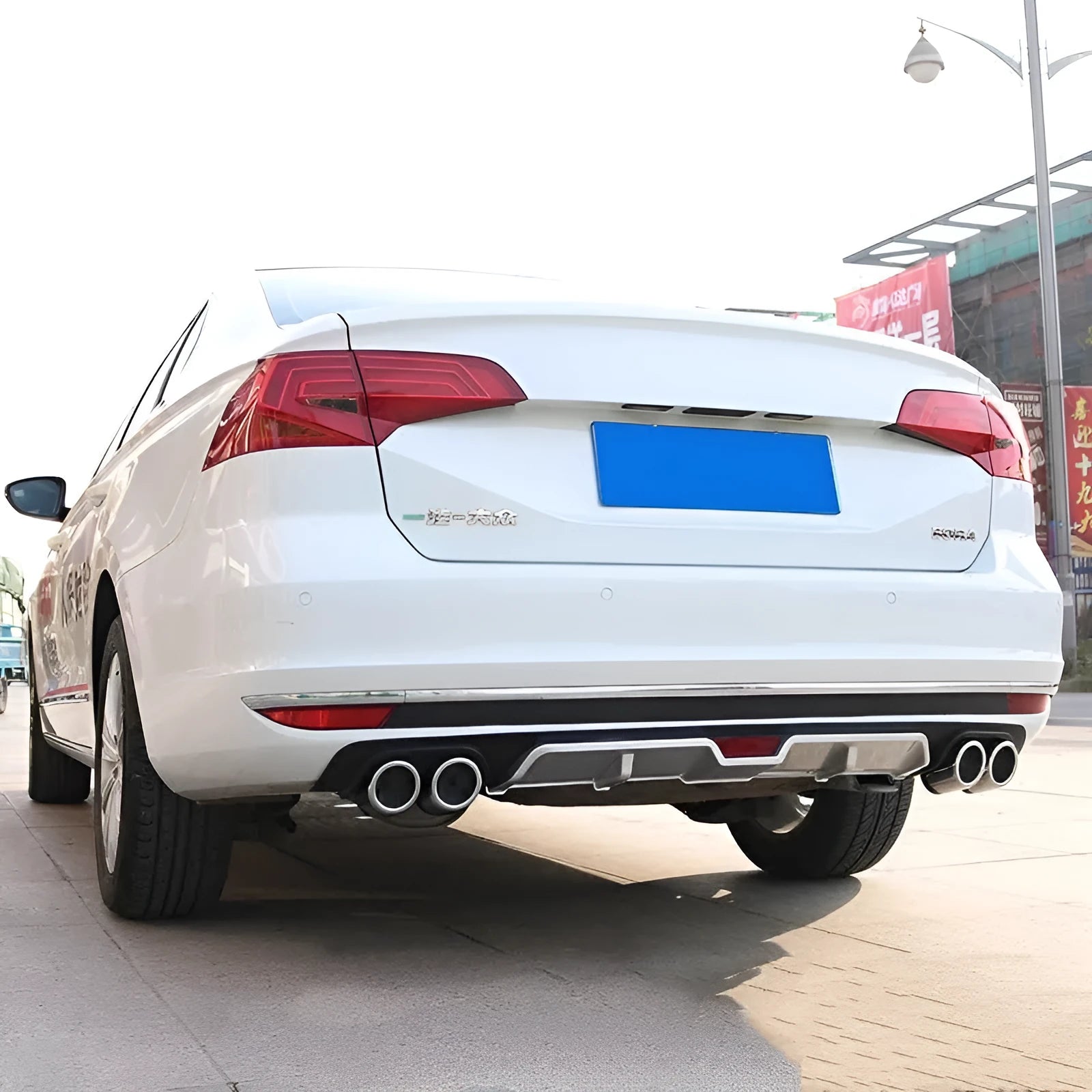 PP plastic car rear bumper spoiler shown in black, demonstrating its length and solid moulded shape.