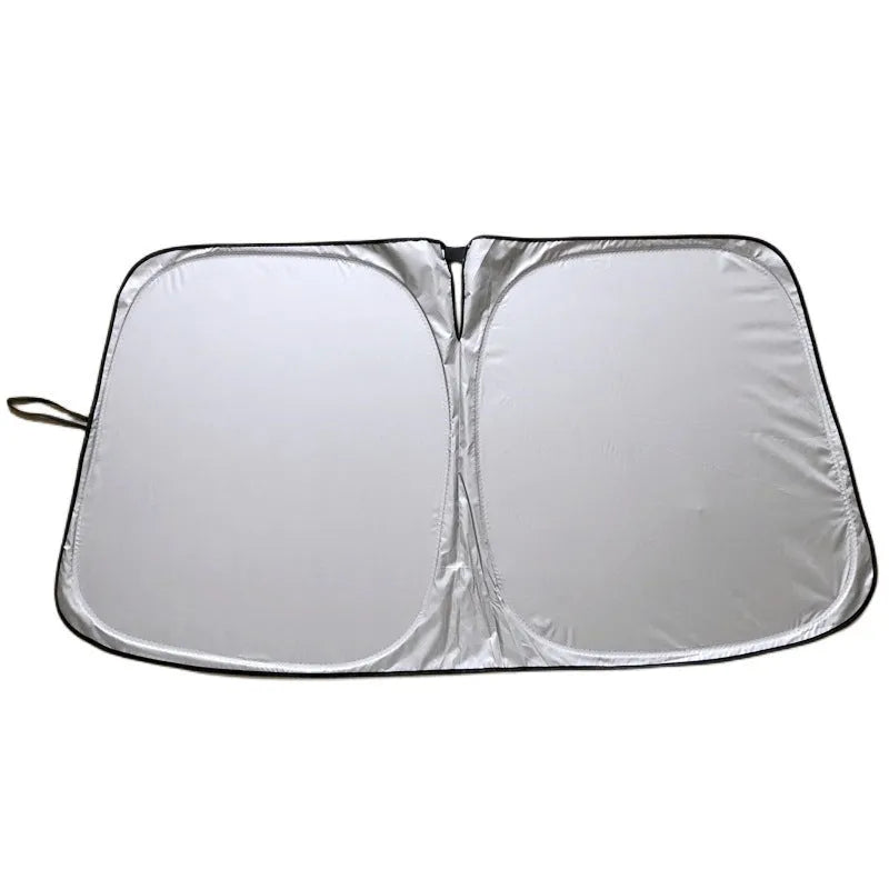 Aluminium foil car sunshade in titanium silver colour, folded flat.