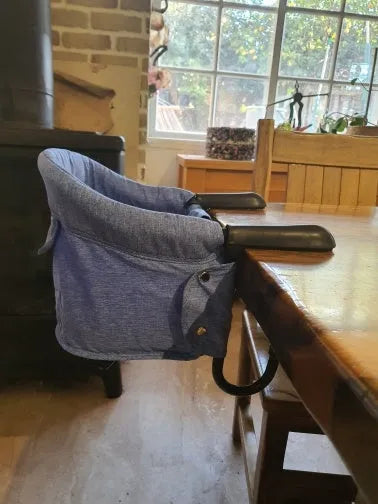 Portable baby high chair with safety belt and expandable seat in blue colour