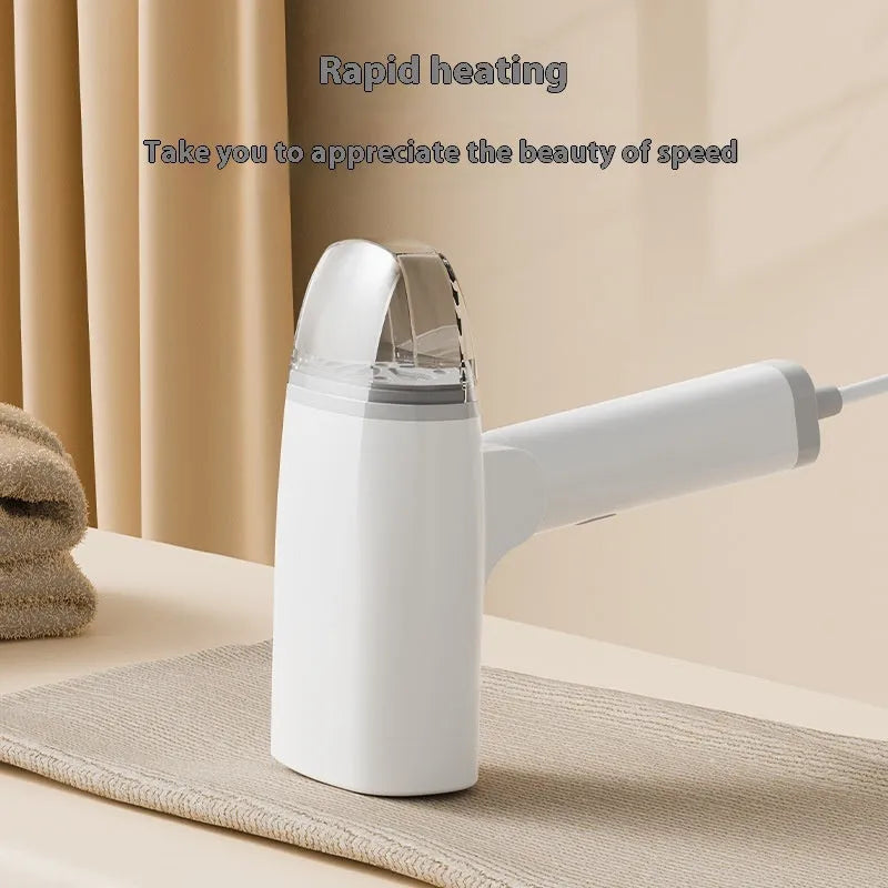 Blue and white handheld garment steamer with mechanical controls and 1300W power rating