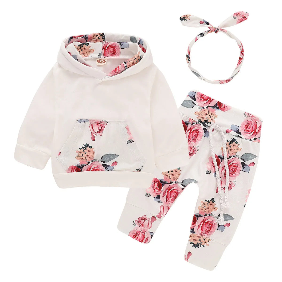 White print hooded romper suit for baby girls made from soft cotton with long sleeves and trousers.