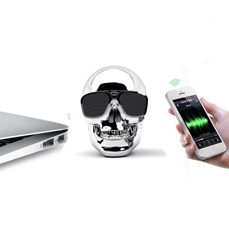 Skull-shaped portable Bluetooth speaker with 10-hour battery in multiple colour options