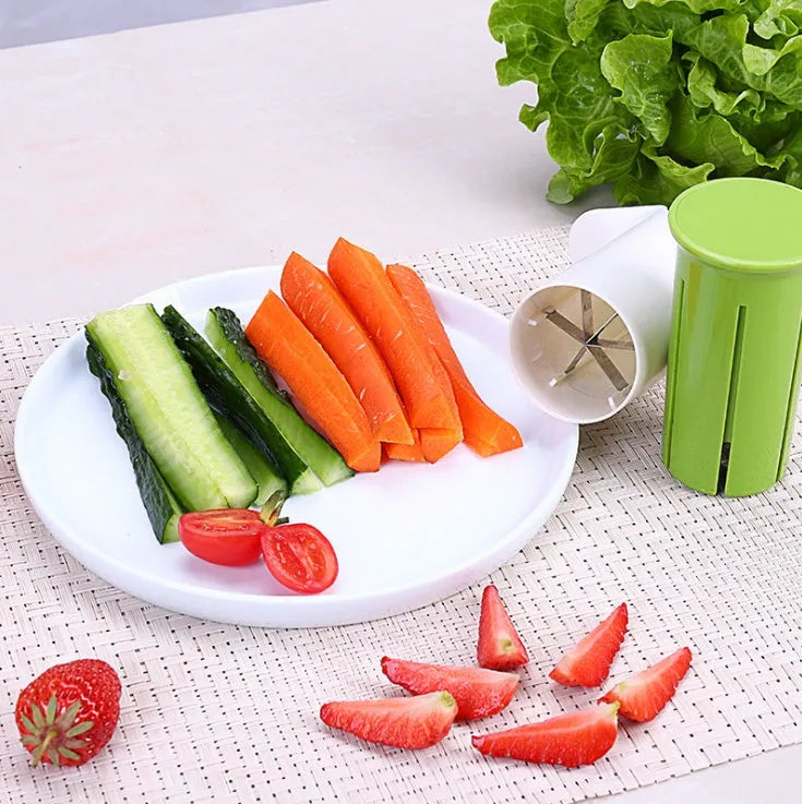White vegetable cutter with stainless steel blades for slicing cucumbers carrots and strawberries