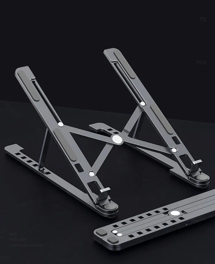 Foldable aluminium laptop stand in silver, shown open for use and folded for storage.