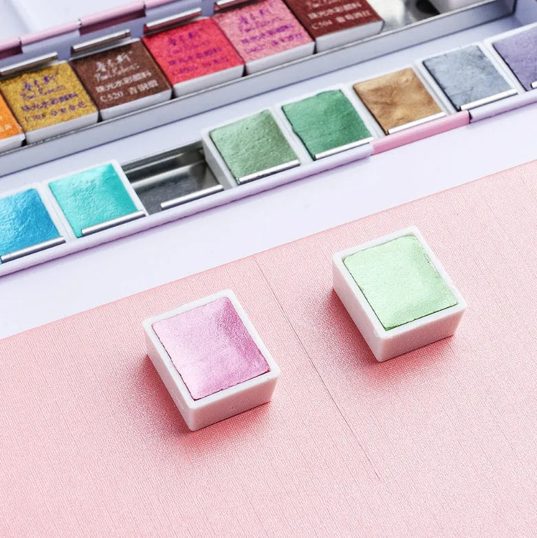 Solid watercolour paint set with pearl finish showing 12 and 24 colour options.