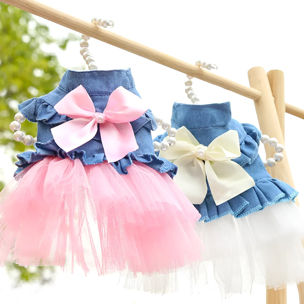 Korean-inspired pink denim pet skirt with a large bow on a dog model.