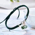 Women's bracelet with a natural strawberry-shaped crystal charm in one of three colour choices.