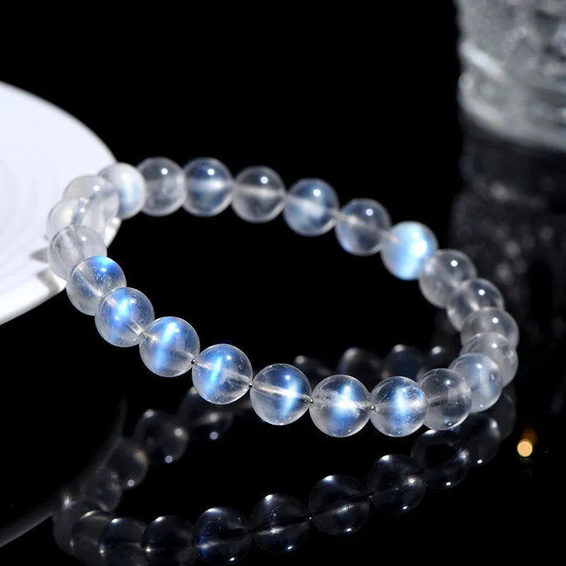 Natural cream body blue moonlight crystal bracelet in a minimalist unisex style.