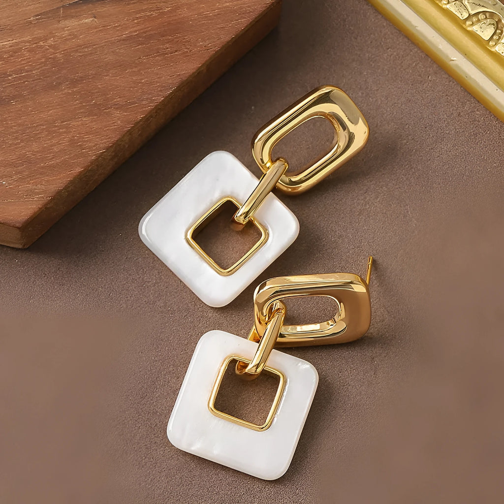 Copper hollow geometric square earrings with chamfered corners in gold or blue electroplated finish