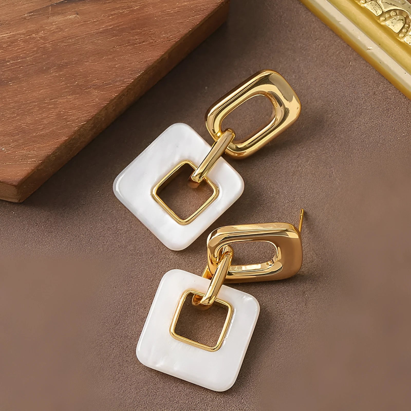 Copper hollow geometric square earrings with chamfered corners in gold or blue electroplated finish