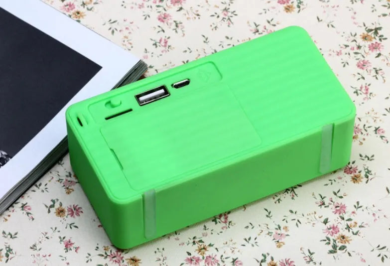 Cannon X3 cube-shaped portable Bluetooth speaker in black, blue, green, red, and yellow colour options.