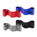 Black elastic elbow support compression sleeve worn on an arm.