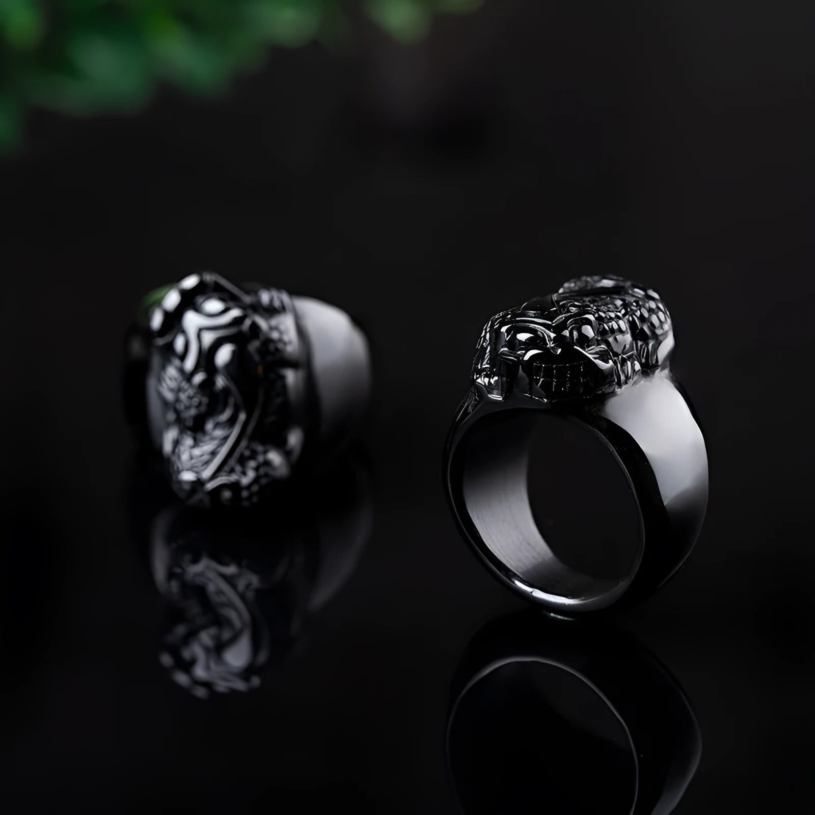 Men's obsidian crystal thumb ring featuring a detailed pixiu carving and a natural gold sheen.