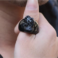 Men's obsidian crystal thumb ring featuring a detailed pixiu carving and a natural gold sheen.