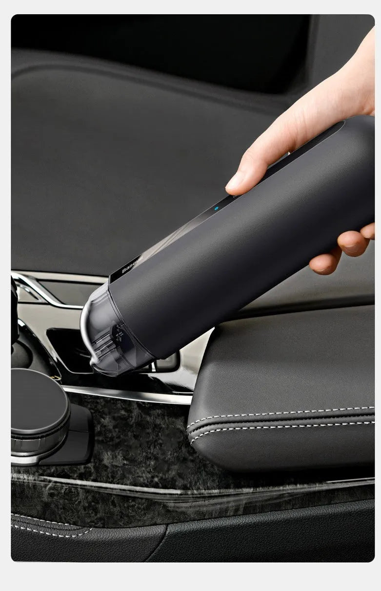 Baseus handheld car vacuum cleaner in black, white, or green next to a dust bin and blowing hose.