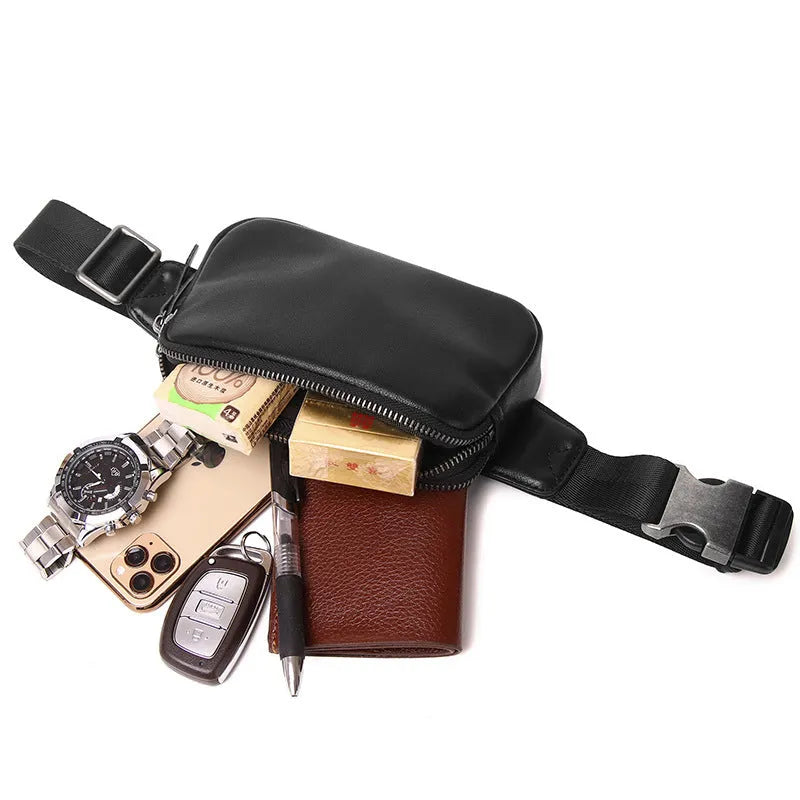 Men's small leather crossbody bag in black showing 17cm width dimensions