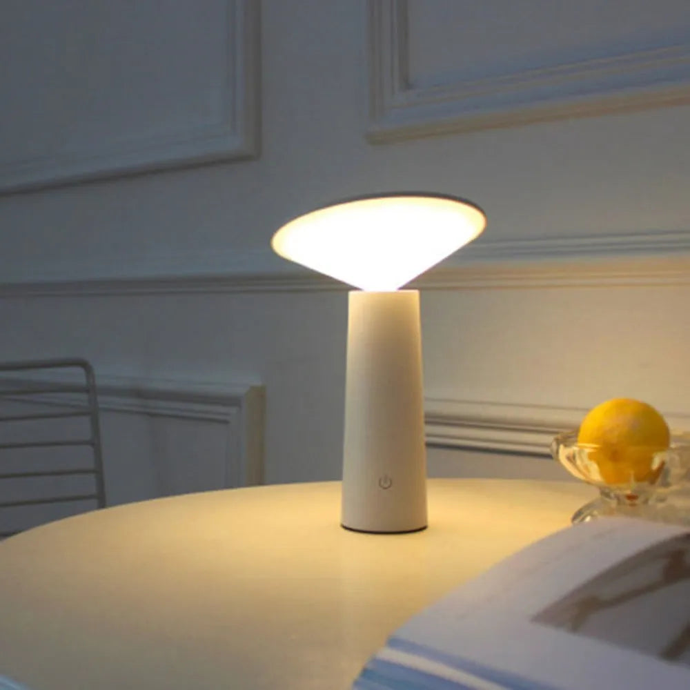 Black USB-powered table lamp with a touch sensor base and an angled LED reading light head.