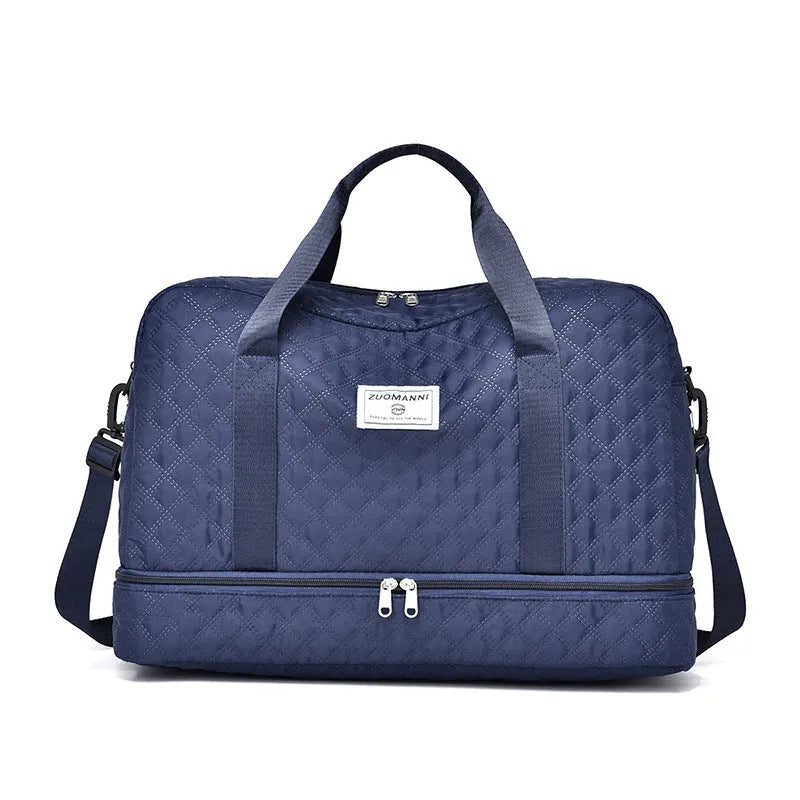 Large Oxford cloth travel holdall in a solid colour, shown with a capacity of 36-55 litres for buggies and luggage.