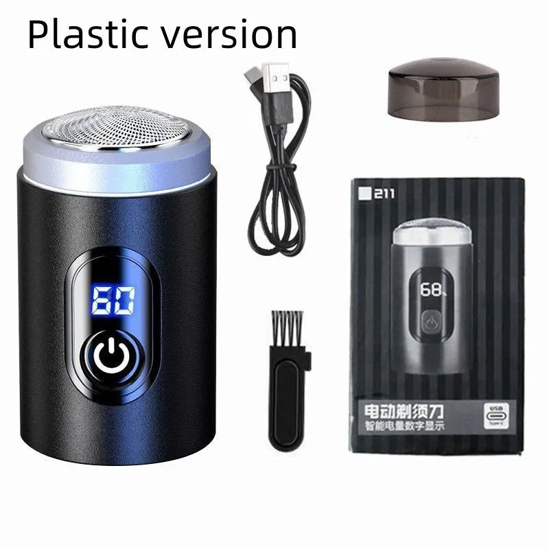 Black portable rechargeable shaver with USB cable and cleaning brush on a white background.