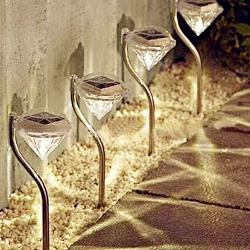 Solar powered diamond-shaped garden spotlight with adjustable angle and IP55 waterproof rating