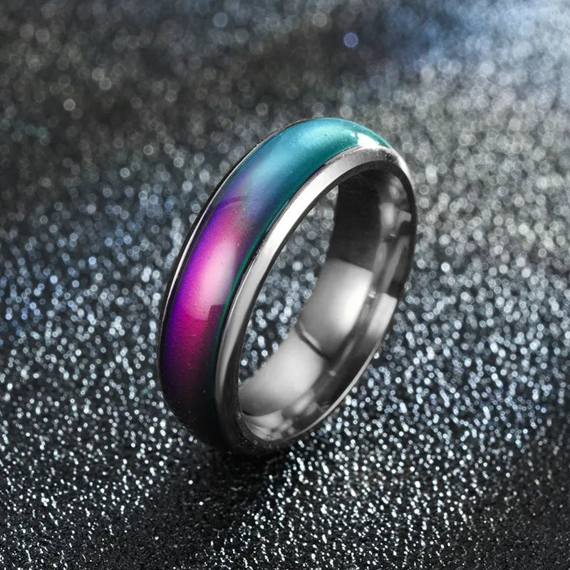 Colour changing mood ring in alloy with temperature-sensitive coating, available in black, gold, multicolor, rose gold, silver