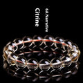 Natural citrine scattered beads ball bracelet showing polished beads on a bracelet base.