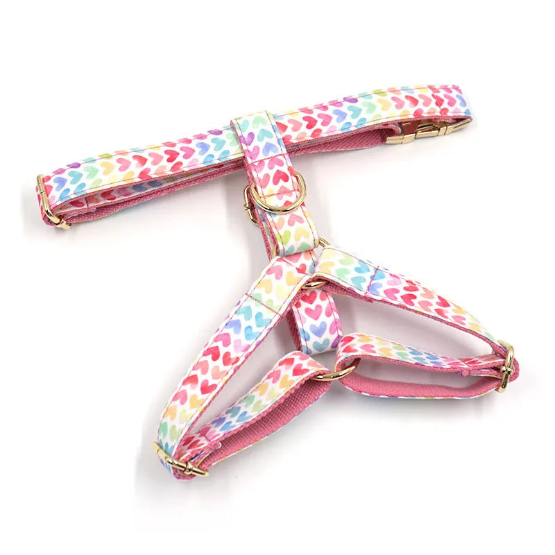 Pink dog harness with gold buckle and heart-shaped stone decoration for small dogs