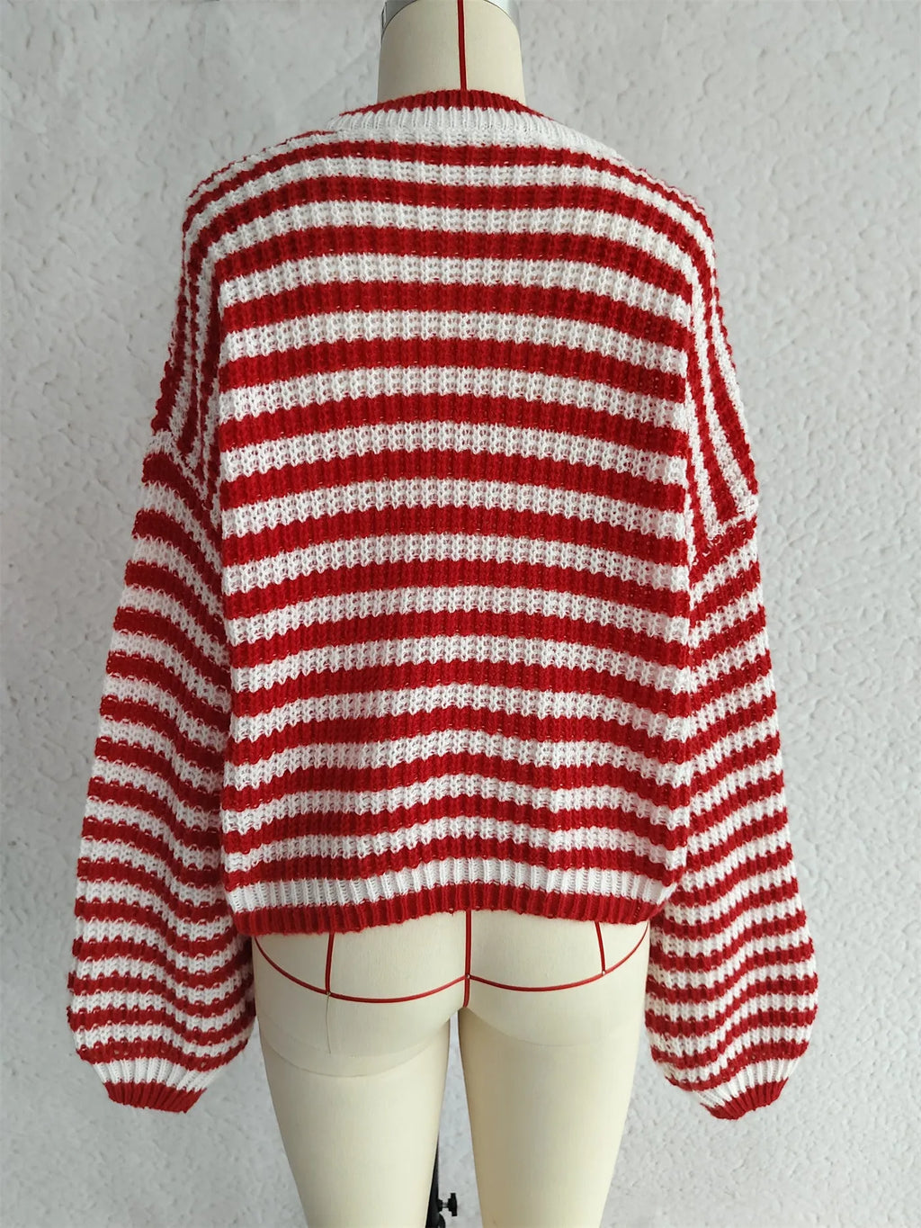 Women's loose vintage stripe knitted pullover sweater in red.