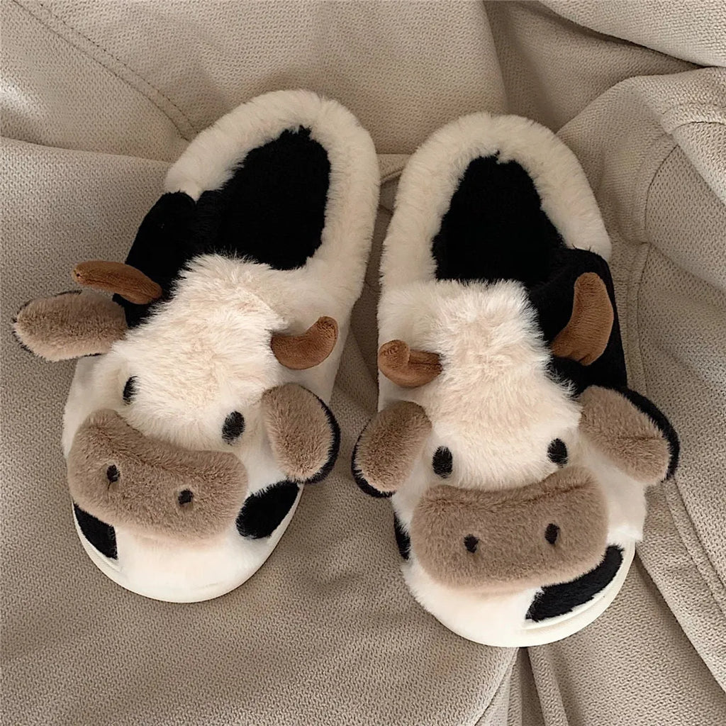 White cow animal slippers with plush faux fur and textured anti-slip soles