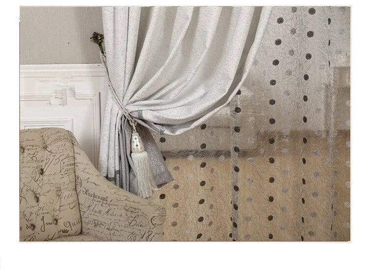 A single blackout curtain panel showing its polyurethane-backed fabric and one of the available hanging styles.