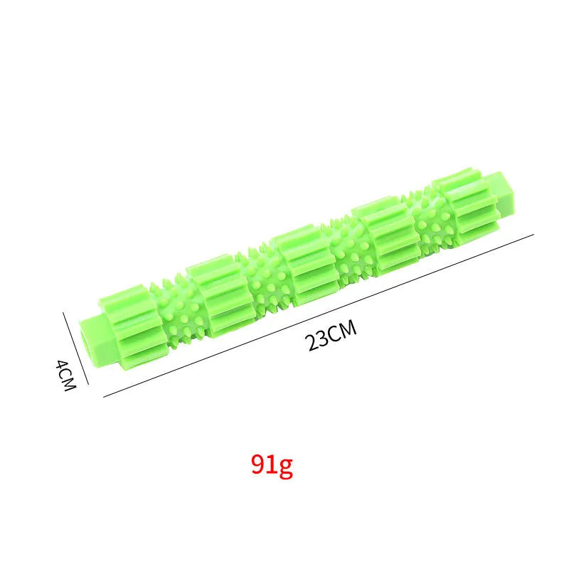 Green and orange rubber dog chew toy with treat dispensing design and textured surface