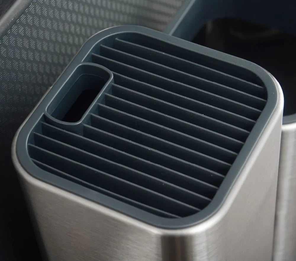 Stainless steel kitchen tool holder with detachable drain base, shown with knives and utensils stored inside.