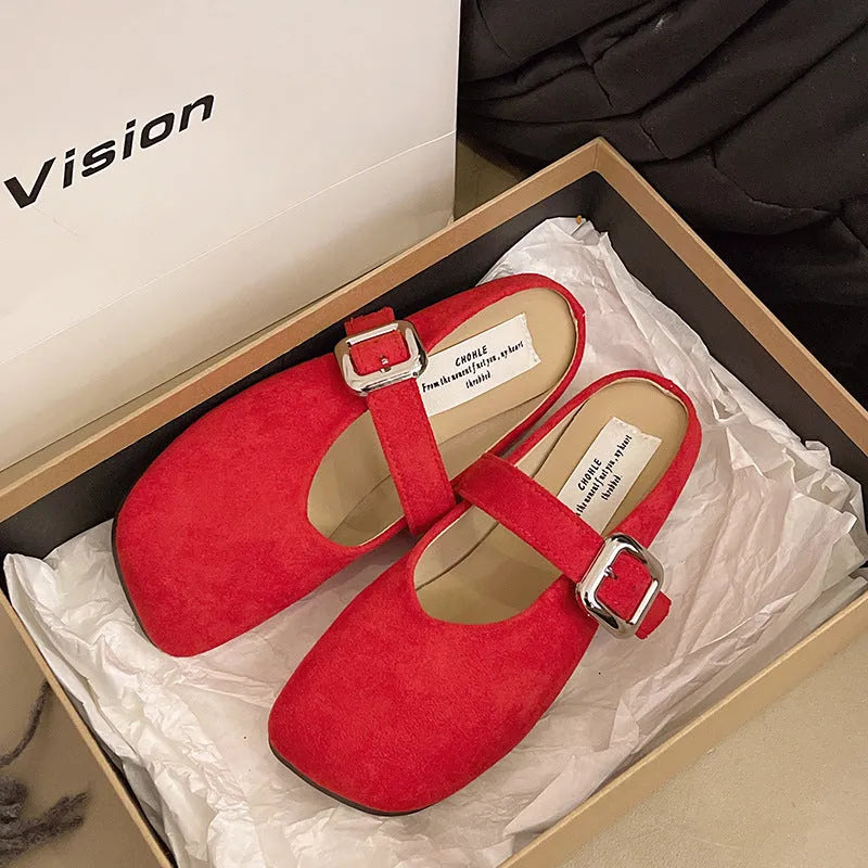 Women's flat closed-toe half slipper in a choice of colours, showing square toe and rubber sole.
