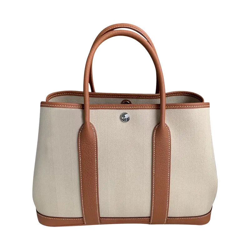Women's canvas bucket tote bag with genuine leather trim in black, brown, grey or red colour