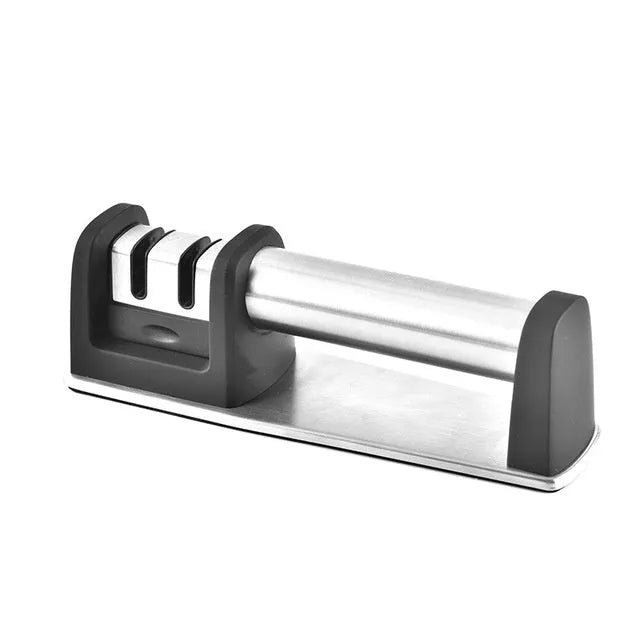 A black manual kitchen knife sharpener made from ABS plastic with an integrated handle.