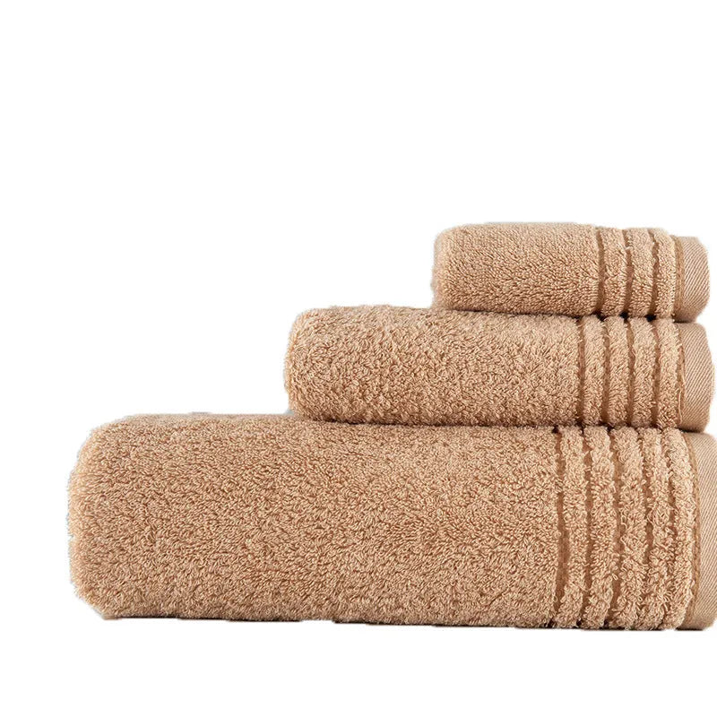 Cotton towel set showing three sizes in beige and brown colours for bathroom use