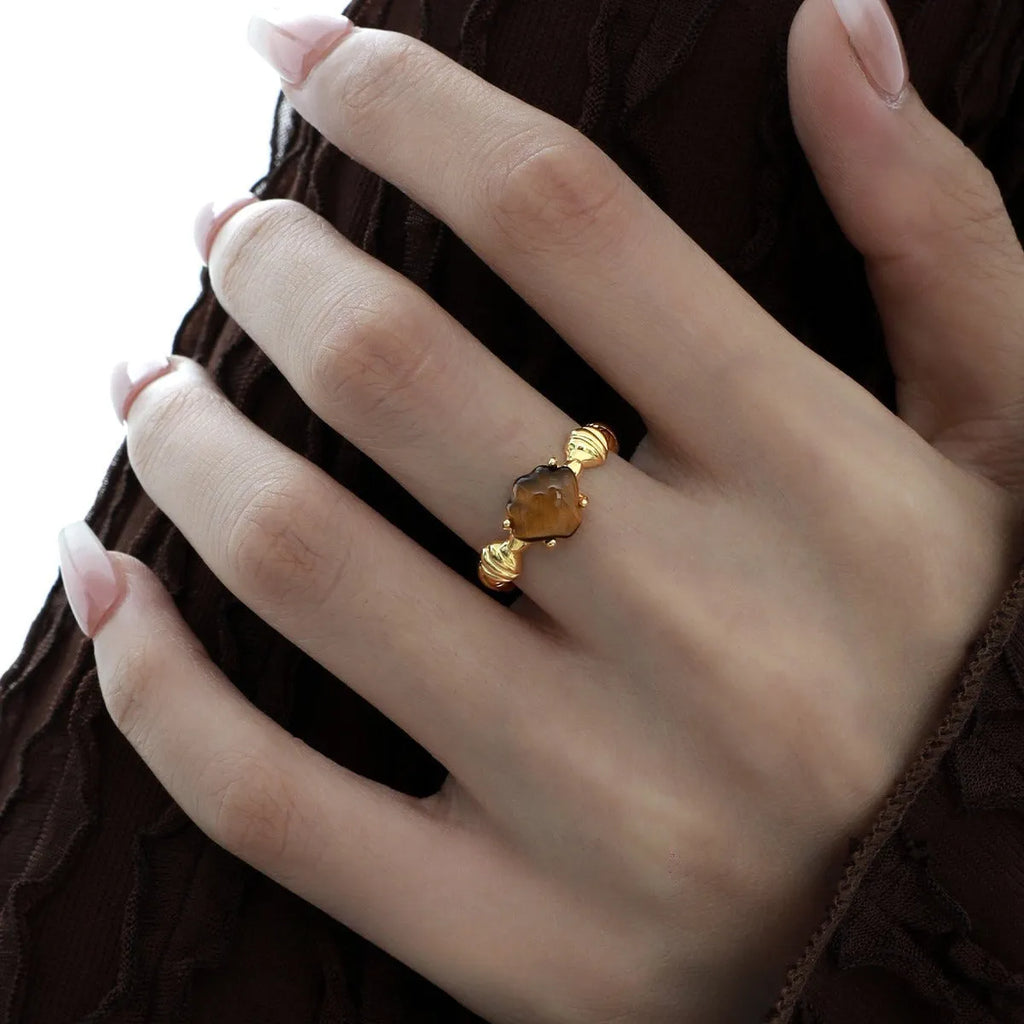 Women's adjustable silver ring featuring a shell tiger eye gemstone in a white gold electroplated finish.