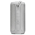 Outdoor waterproof portable Bluetooth speaker in black, camouflage, grey, or red colours.