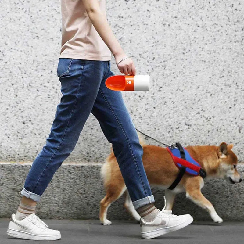 White Moestar Rocket Pet Cup with grey accents, showing the water outlet and one-button lock on a portable dog water bottle.