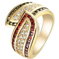 Gold tone alloy women's ring with a central peridot green stone.