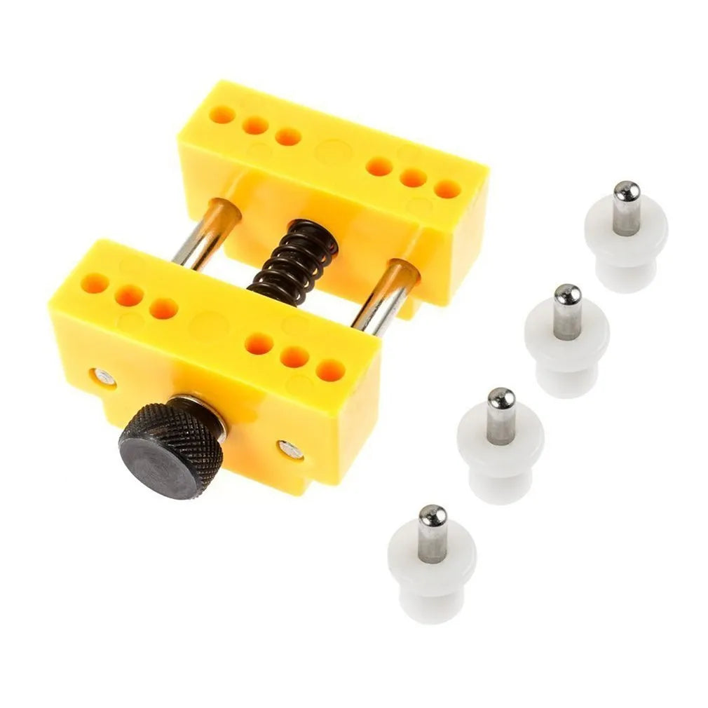 Yellow plastic watch repair kit with adjustable opener tool and fixing base